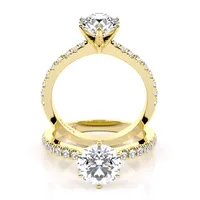 Claire Six Claw Solitaire and Sidestone engagement ring in 18kt yellow gold, front view thumbnail 2