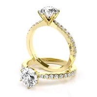 Claire Six Claw Solitaire and Sidestone engagement ring in 18kt yellow gold thumbnail 1