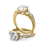 Kelly Solitaire with Marquise Sidestones engagement ring with round centre in 18kt yellow gold thumbnail 1