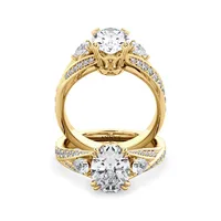 Roxy Pear Three Stone and Sidestone engagement ring with oval centre in 18kt yellow gold, front view thumbnail 2