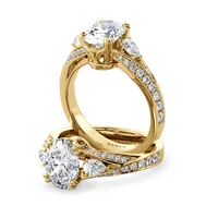 Roxy Pear Three Stone and Sidestone engagement ring with oval centre in 18kt yellow gold thumbnail 1