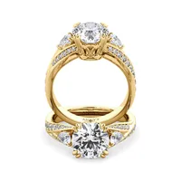 Roxy Pear Three Stone and Sidestone engagement ring with round centre in 18kt yellow gold, front view thumbnail 2