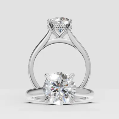 Hero image for Celeste Hidden Halo and Sidestone Engagement Ring