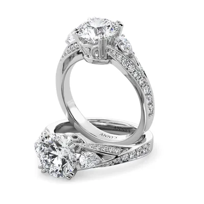Roxy Pear Three Stone and Sidestone engagement ring with round centre in 18kt white gold