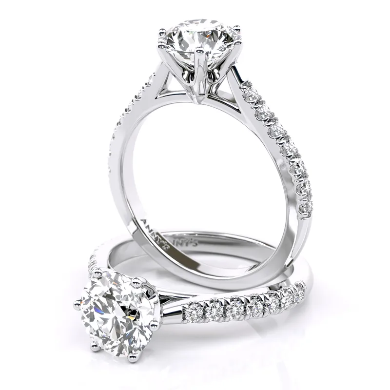 Alessandra Six Claw Cathedral Solitaire and Sidestone engagement ring