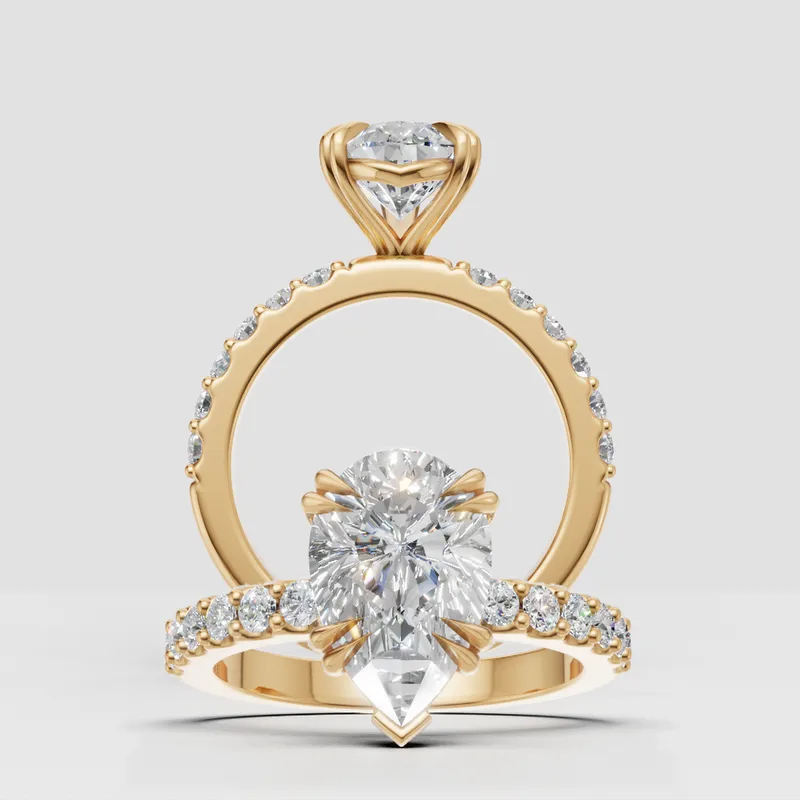 Estelle Double Claw Solitaire and sidestone engagement ring