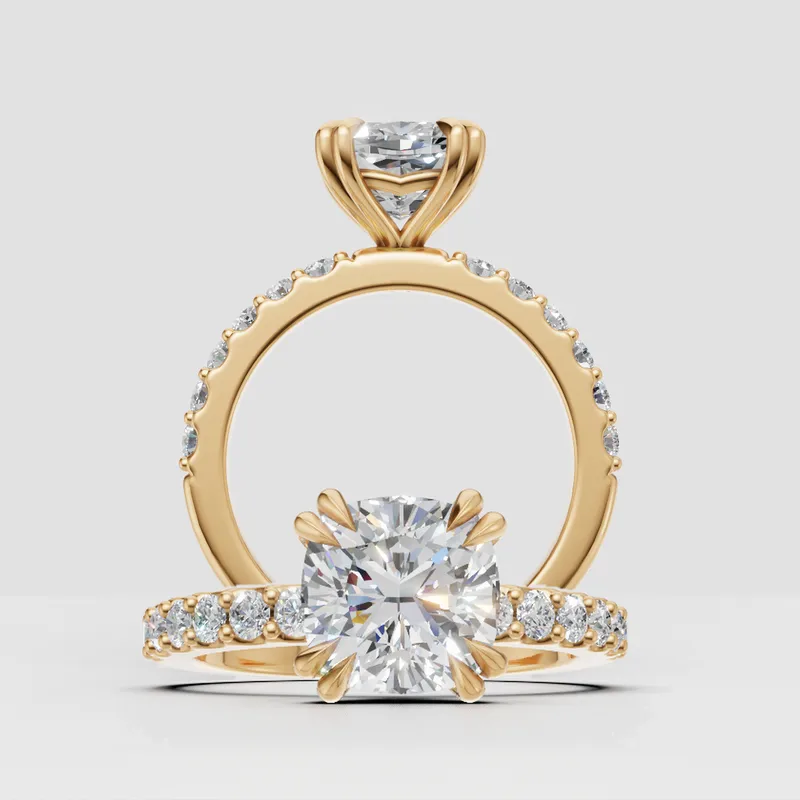 Estelle Double Claw Solitaire and sidestone engagement ring
