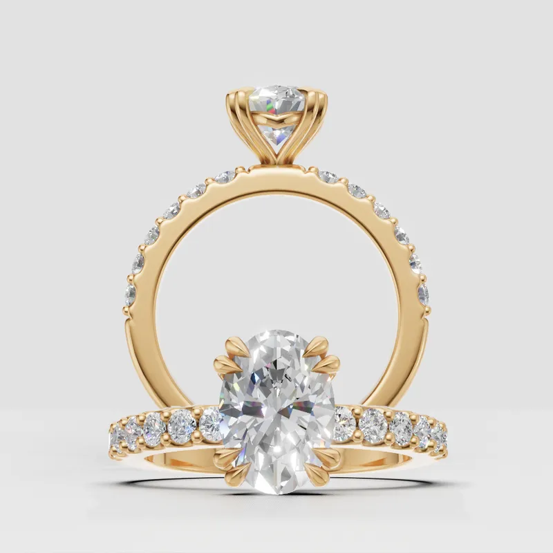 Estelle Double Claw Solitaire and sidestone engagement ring