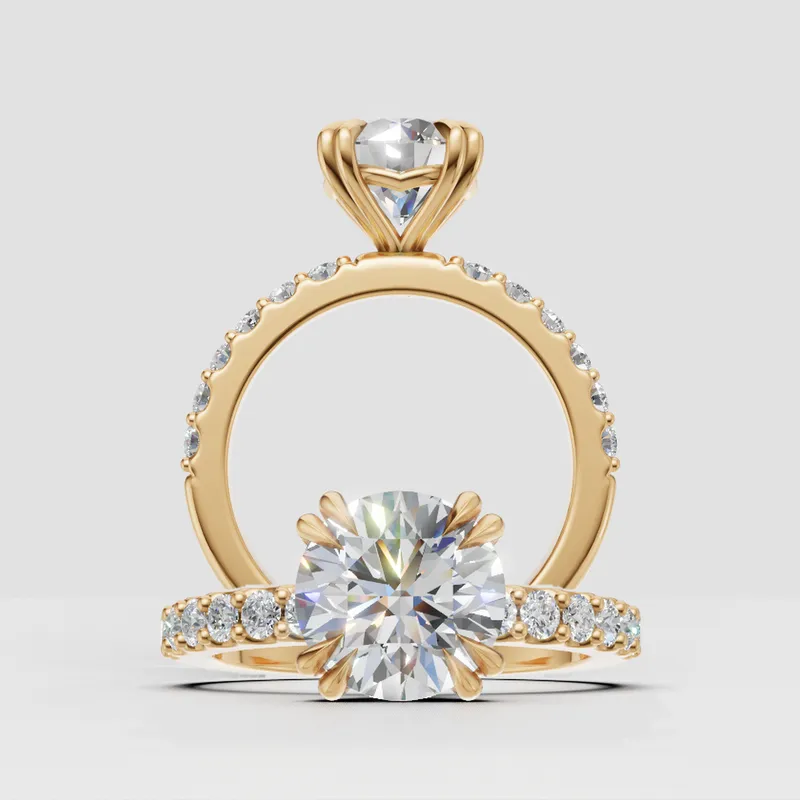 Estelle Double Claw Solitaire and sidestone engagement ring