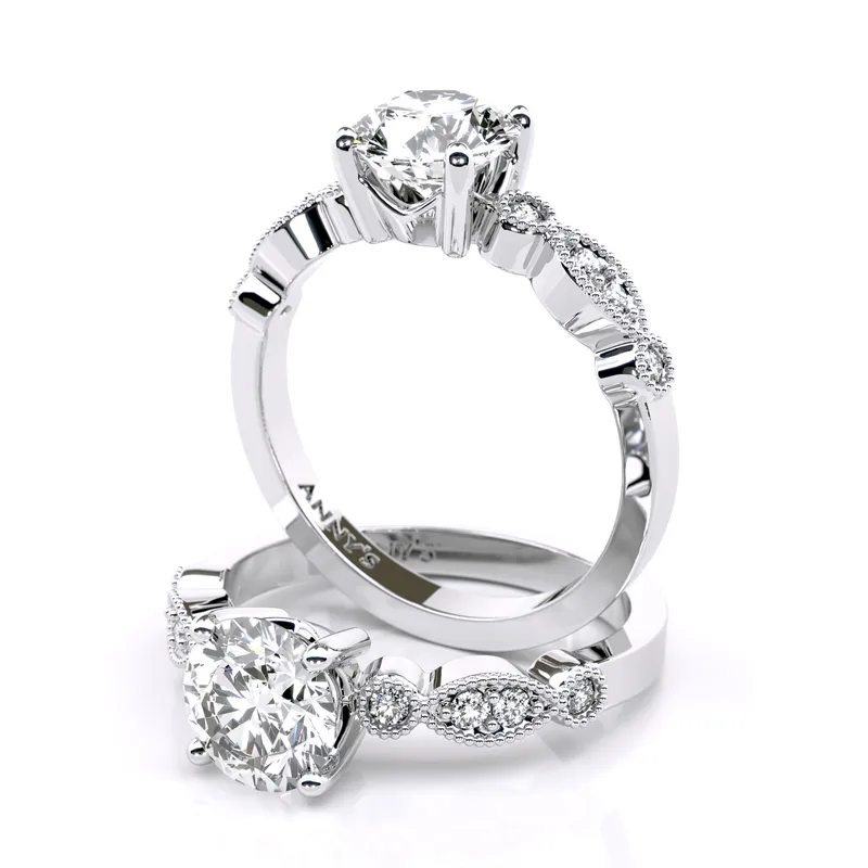Gwen Vintage Solitaire and Sidestone engagement ring