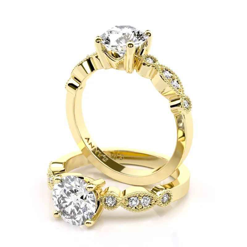 Gwen Vintage Solitaire and Sidestone engagement ring in 18kt yellow gold