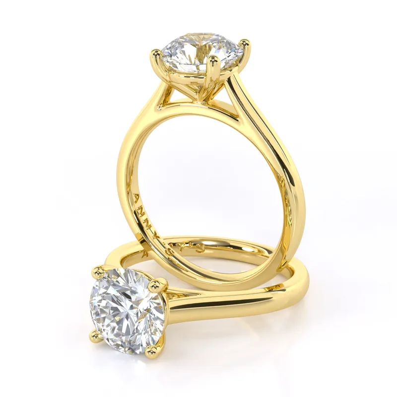Isla Four Claw Cathedral Solitaire engagement ring in 18kt yellow gold