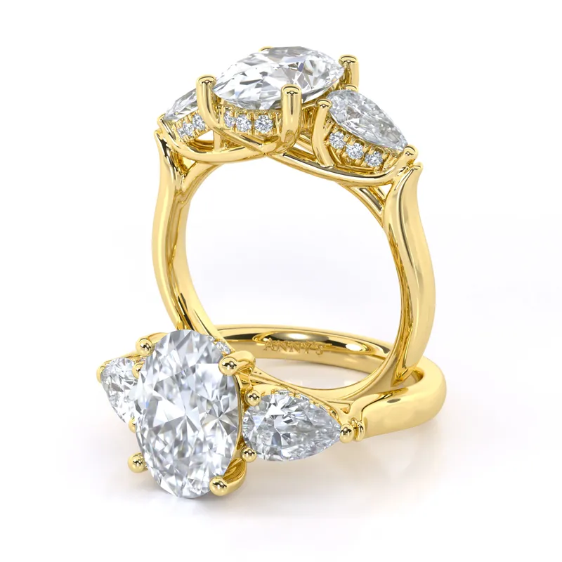 Jasmine Oval and Pear Three Stone engagement ring in 18kt yellow gold