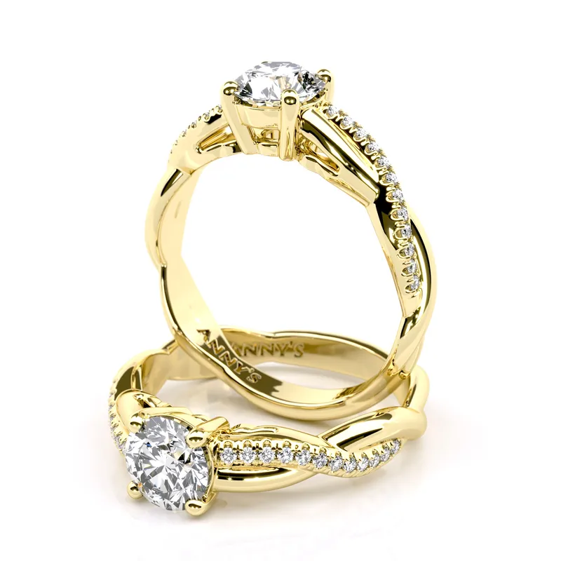 Jennifer Twist Solitaire and Sidestone engagement ring in 18kt yellow gold
