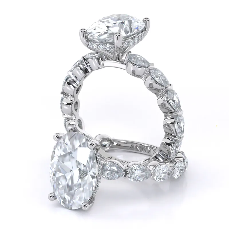 Lara Solitaire with Pear and Round Sidestones engagement ring