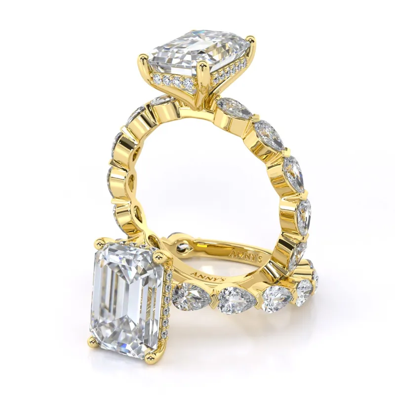 Lara Solitaire with Pear and Round Sidestones engagement ring