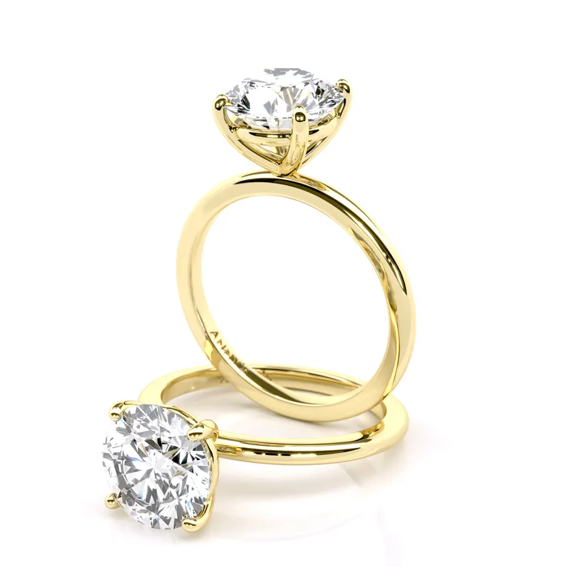 Rain Six Claw Solitaire engagement ring in 18kt yellow gold