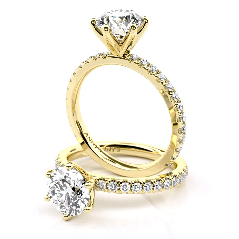 Sienna Six Claw Solitaire and Sidestone engagement ring in 18kt yellow gold