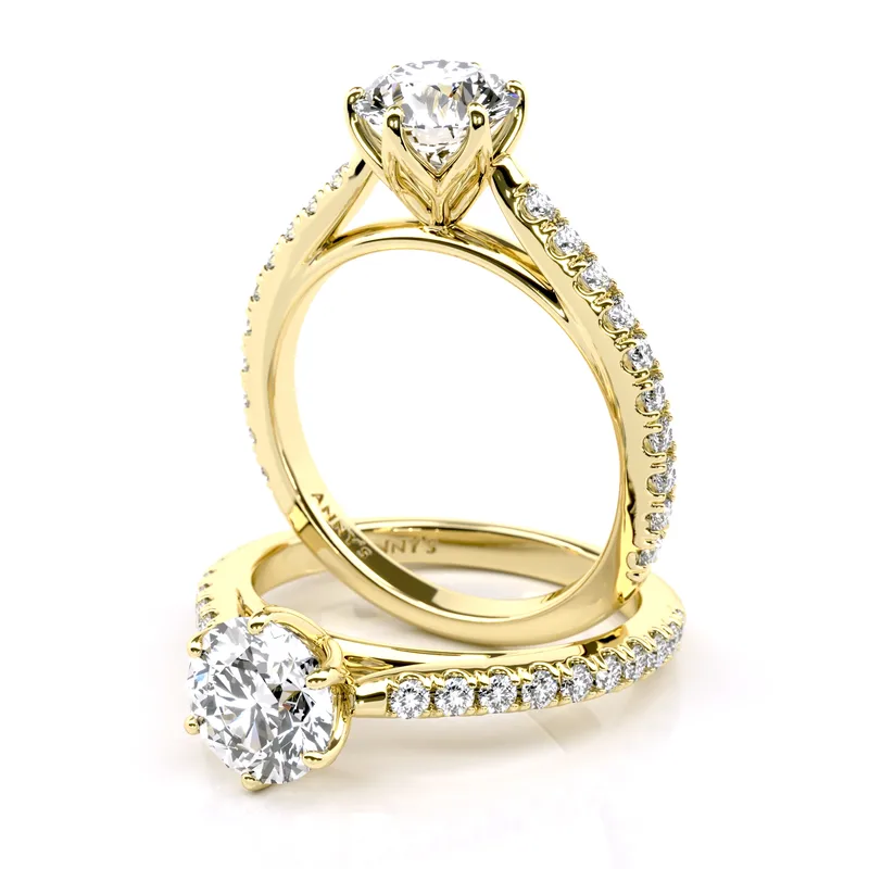 Veronica Six Claw Cathedral Solitaire and Sidestone engagement ring in 18kt yellow gold