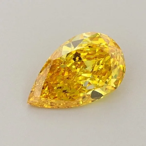 0.62ct PEAR Fancy Vivid Yellow VS1 Coloured Lab diamond