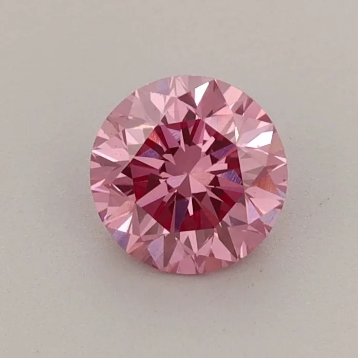 0.63ct ROUND Fancy Vivid Pink VS2 Coloured Lab diamond