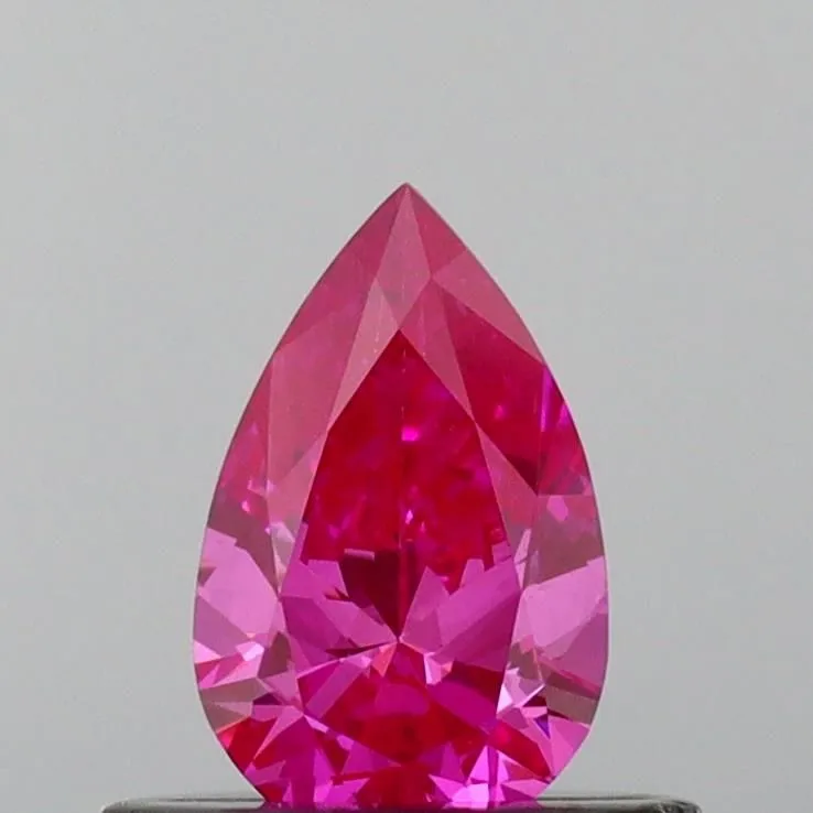 0.40ct PEAR Fancy Vivid Pink VS1 Coloured Lab diamond