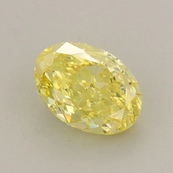 0.71ct OVAL Fancy Vivid Yellow VS1 Coloured Lab diamond