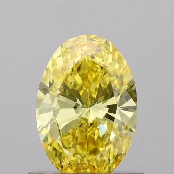 0.78ct OVAL Fancy Vivid Yellow VS2 Coloured Lab diamond