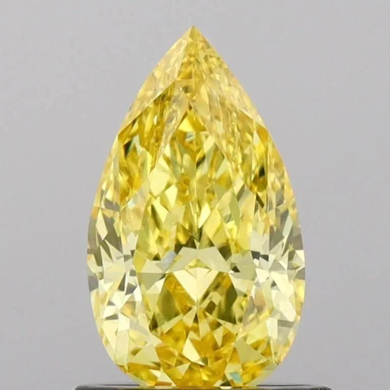 0.87ct PEAR Fancy Vivid Yellow VS1 Coloured Lab diamond