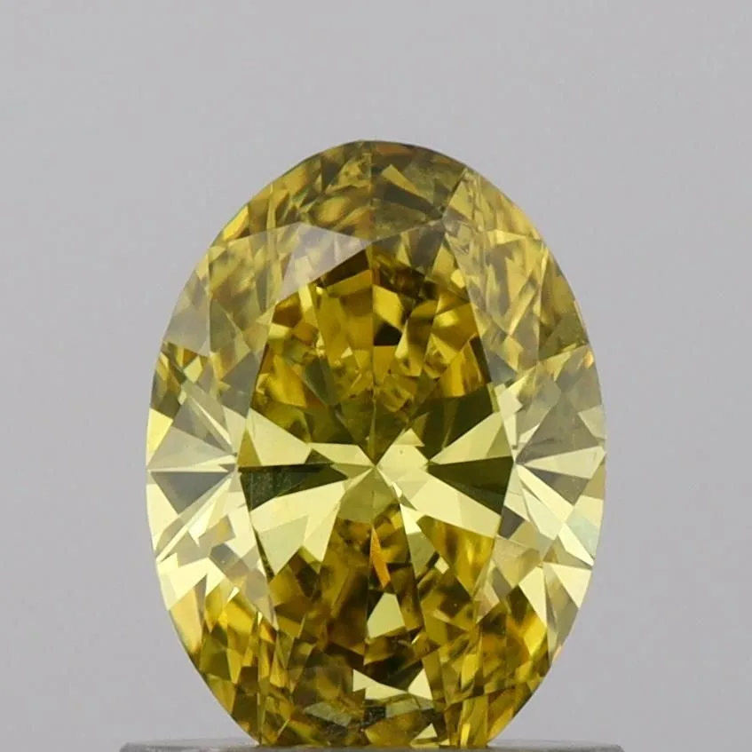 0.87ct OVAL Fancy Vivid Yellow VS1 Coloured Lab diamond