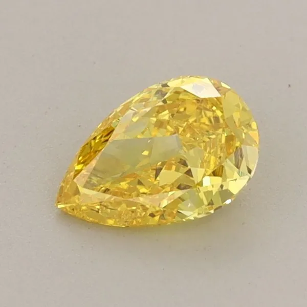 0.54ct PEAR Fancy Vivid Yellow VVS2 Coloured Lab diamond