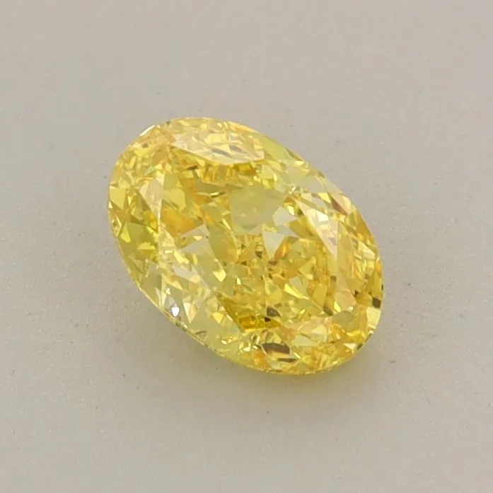 0.58ct OVAL Fancy Vivid Yellow VVS2 Coloured Lab diamond