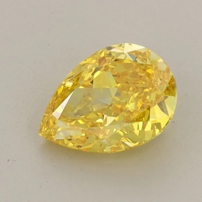 0.86ct PEAR Fancy Vivid Yellow VVS2 Coloured Lab diamond