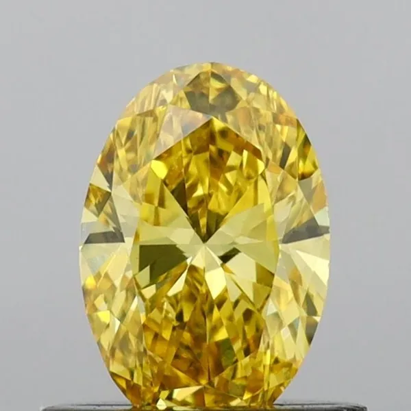 0.57ct OVAL Fancy Vivid Yellow VS1 Coloured Lab diamond