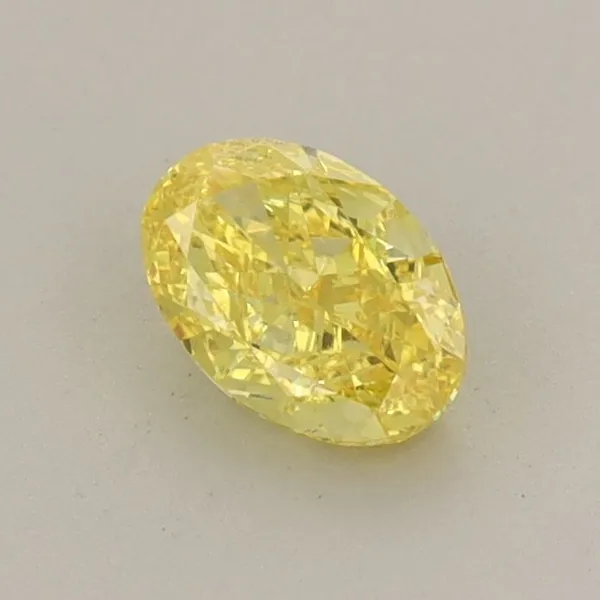 0.52ct OVAL Fancy Vivid Yellow VS1 Coloured Lab diamond