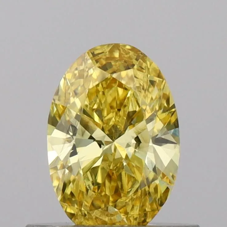 0.56ct OVAL Fancy Vivid Yellow VS1 Coloured Lab diamond
