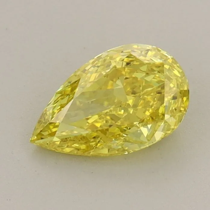 0.71ct PEAR Fancy Vivid Yellow VS1 Coloured Lab diamond