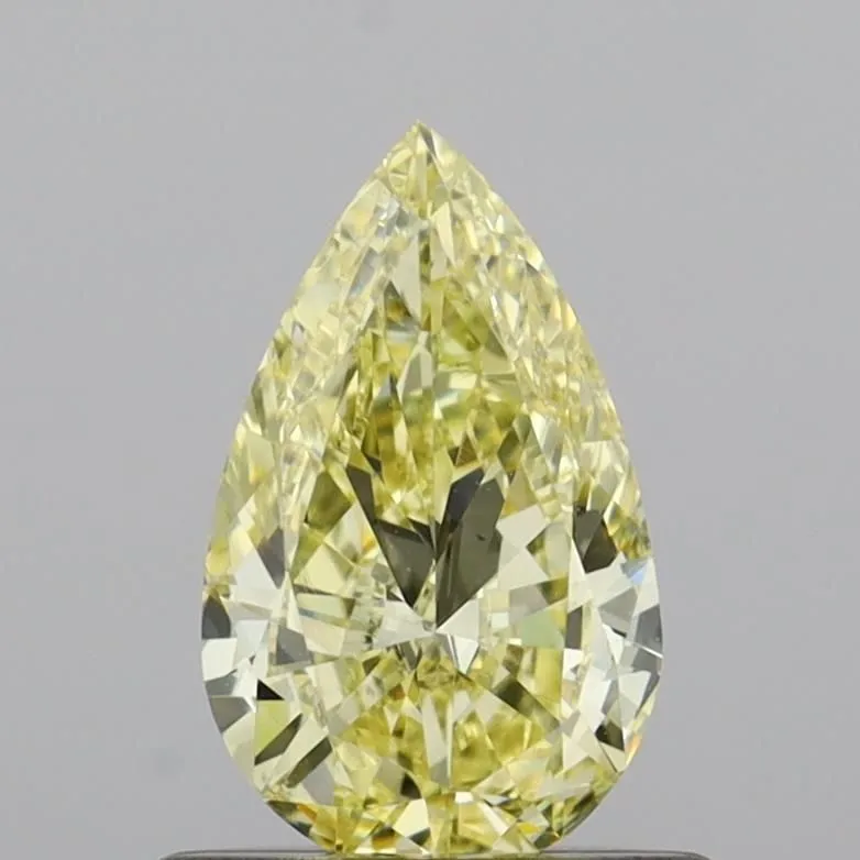 0.58ct PEAR Fancy Yellow VS1 Coloured Lab diamond