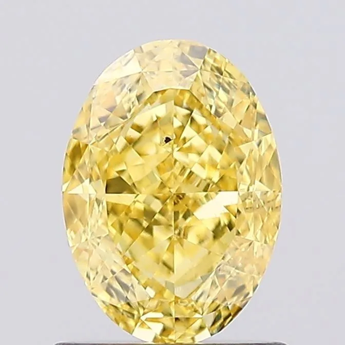 1.06ct OVAL Fancy Vivid Yellow VS2 Coloured Lab diamond