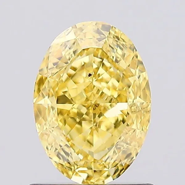 1.06ct OVAL Fancy Vivid Yellow VS2 Coloured Lab diamond
