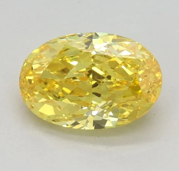 0.71ct OVAL Fancy Vivid Yellow VS1 Coloured Lab diamond