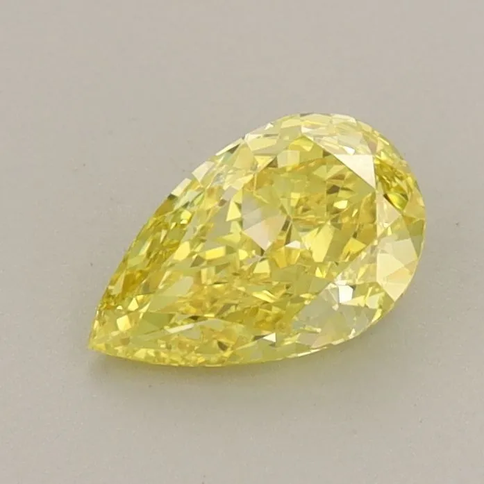 0.63ct PEAR Fancy Vivid Yellow VVS2 Coloured Lab diamond