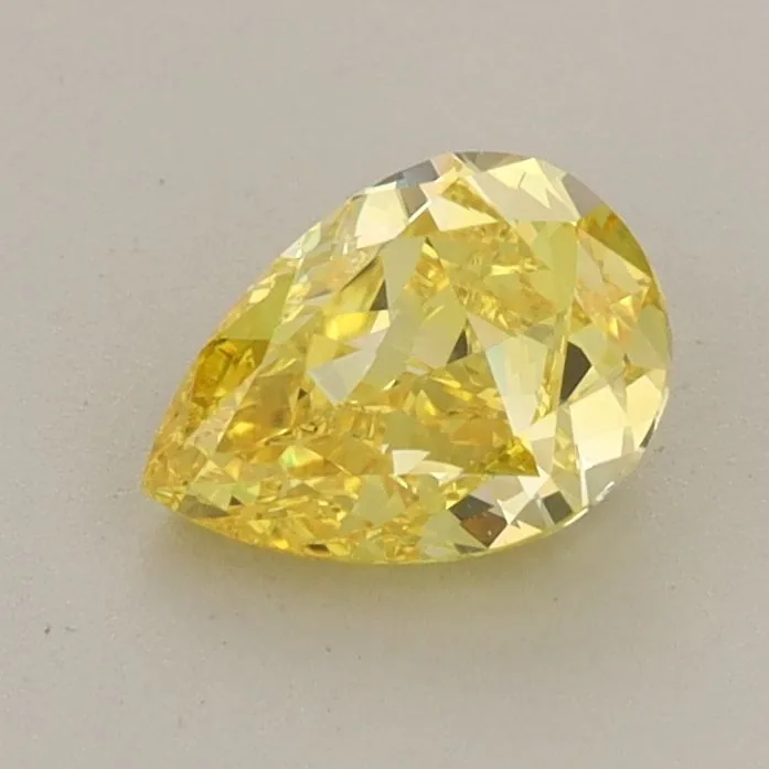 0.88ct PEAR Fancy Vivid Yellow VVS2 Coloured Lab diamond