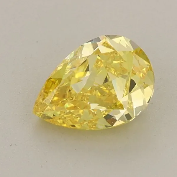 0.88ct PEAR Fancy Vivid Yellow VVS2 Coloured Lab diamond