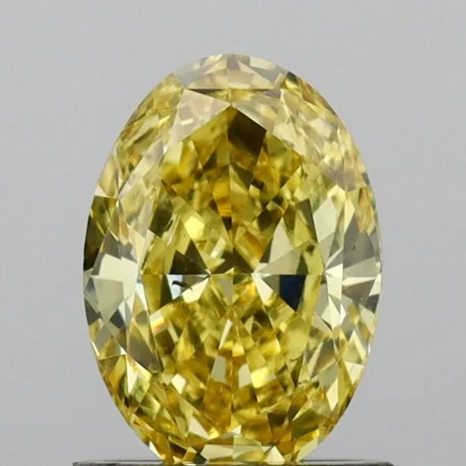 1.13ct OVAL Fancy Vivid Yellow VS2 Coloured Lab diamond
