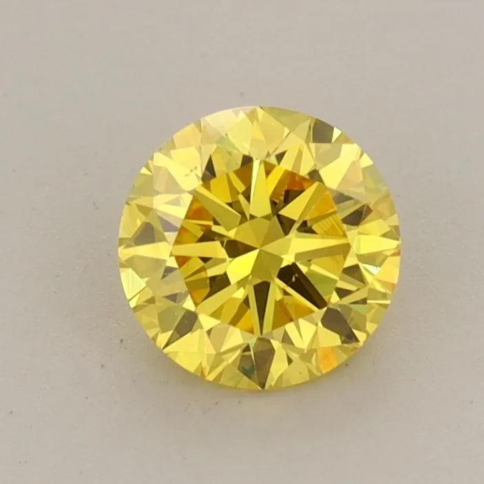 0.68ct ROUND Fancy Vivid Yellow VS1 Coloured Lab diamond