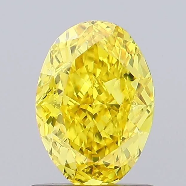0.95ct OVAL Fancy Vivid Yellow VS1 Coloured Lab diamond