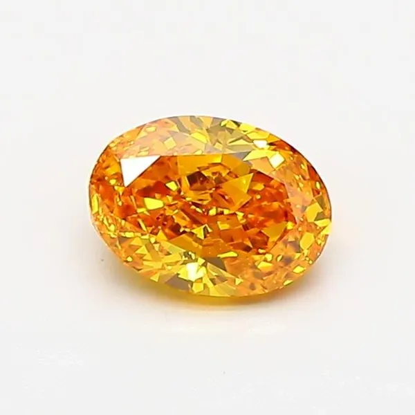 0.71ct OVAL Fancy Vivid Orangey Yellow VS1 Coloured Lab diamond