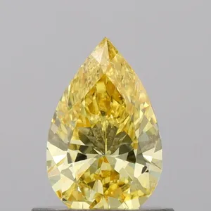 0.63ct PEAR Fancy Vivid Yellow VS1 Coloured Lab diamond