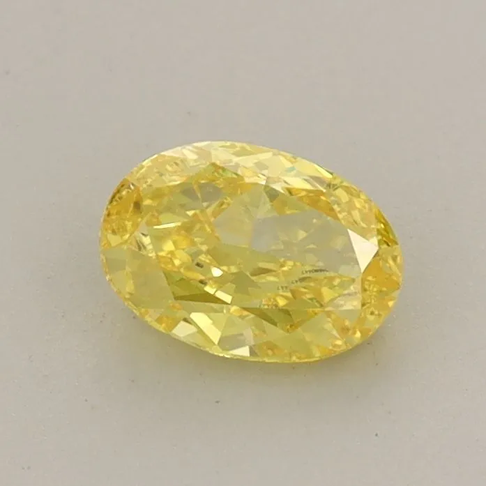 0.57ct OVAL Fancy Vivid Yellow VS1 Coloured Lab diamond